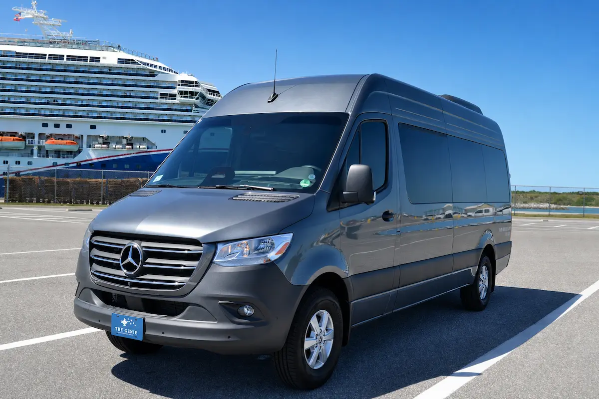 Premium private transfer vehicle parked at Port Canaveral for luxury cruise shuttle service to Royal Caribbean ships by The Genie