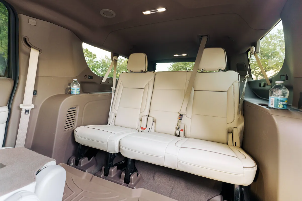 Fleet of spacious luxury SUVs providing private airport transportation with real-time flight monitoring in Orlando by The Genie.