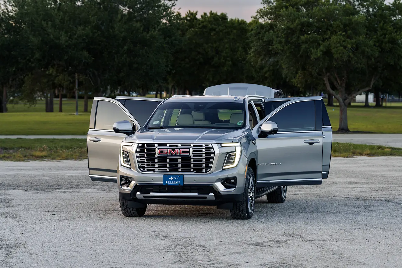 Premium private car with open doors, ready for luxury airport transfers and cruise shuttle service to Port Canaveral by The Genie.