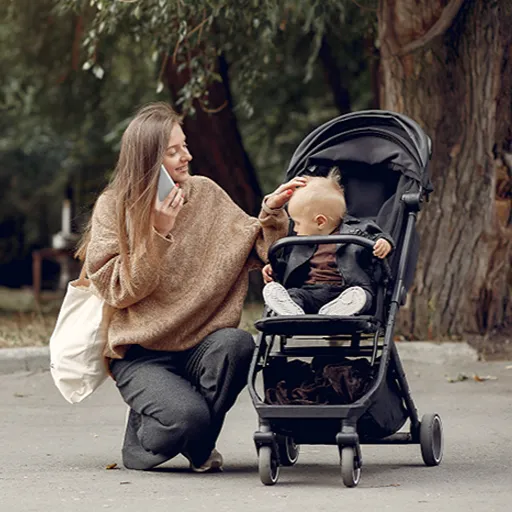 Boy on a premium stroller loaded in private transportation vehicle
