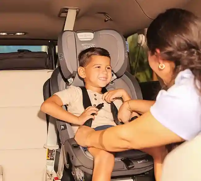 Boy on a premium stroller loaded in private transportation vehicle