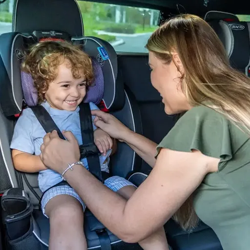 Boy on a premium stroller loaded in private transportation vehicle
